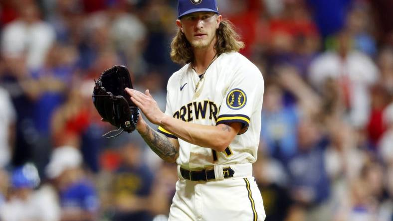 Jun 20, 2022; Milwaukee, Wisconsin, USA;  Milwaukee Brewers pitcher Josh Hader (71) reacts to the final out of the game against the St. Louis Cardinals at American Family Field. Mandatory Credit: Jeff Hanisch-USA TODAY Sports