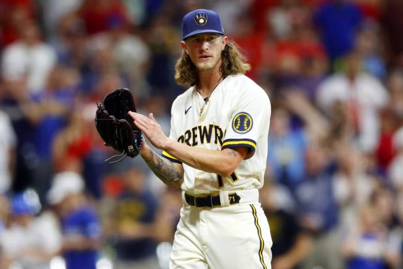 Jun 20, 2022; Milwaukee, Wisconsin, USA;  Milwaukee Brewers pitcher Josh Hader (71) reacts to the final out of the game against the St. Louis Cardinals at American Family Field. Mandatory Credit: Jeff Hanisch-USA TODAY Sports