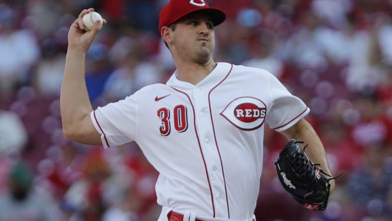 Jun 21, 2022; Cincinnati, Ohio, USA; Cincinnati Reds starting pitcher Tyler Mahle (30) throws a pitch against the Los Angeles Dodgers during the first inning at Great American Ball Park. Mandatory Credit: David Kohl-USA TODAY Sports