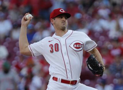 Jun 21, 2022; Cincinnati, Ohio, USA; Cincinnati Reds starting pitcher Tyler Mahle (30) throws a pitch against the Los Angeles Dodgers during the first inning at Great American Ball Park. Mandatory Credit: David Kohl-USA TODAY Sports