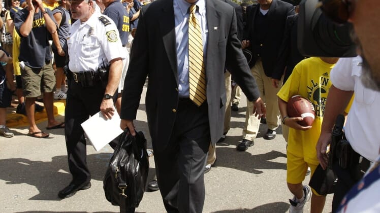 Michigan coach Rich Rodriguez makes the Victory Walk before the game against Western Michigan on Saturday, Sept. 5, 2009, in Michigan Stadium.Mich 090509 Kd008