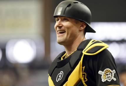 Jun 26, 2022; St. Petersburg, Florida, USA;  Pittsburgh Pirates catcher Tyler Heineman (54) smiles as he looks on during the seventh inning against the Tampa Bay Rays at Tropicana Field. Mandatory Credit: Kim Klement-USA TODAY Sports