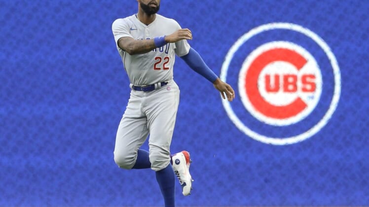 Jun 20, 2022; Pittsburgh, Pennsylvania, USA; Chicago Cubs right fielder Jason Heyward (22) warms up in the outfield before the game against the Pittsburgh Pirates at PNC Park. Mandatory Credit: Charles LeClaire-USA TODAY Sports