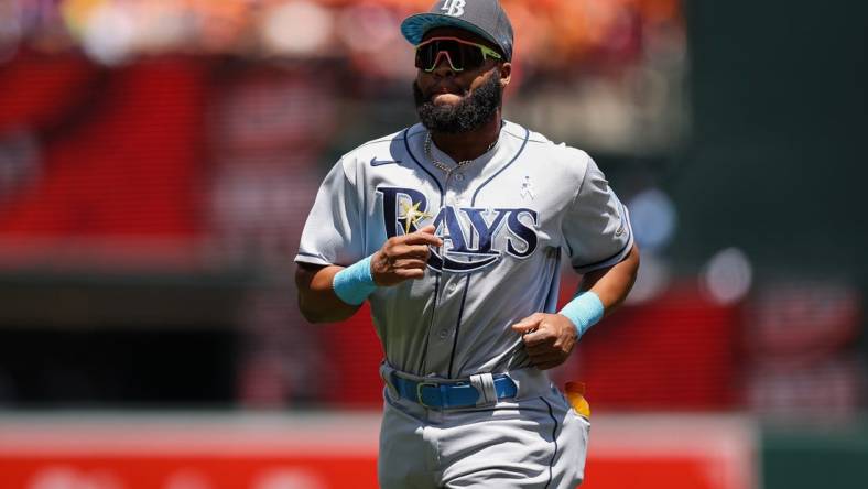 Jun 19, 2022; Baltimore, Maryland, USA; Tampa Bay Rays left fielder Manuel Margot (13) runs on the field before the game against the Baltimore Orioles at Oriole Park at Camden Yards. Mandatory Credit: Scott Taetsch-USA TODAY Sports