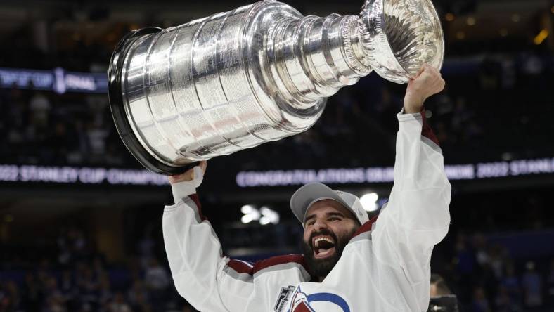 Jun 26, 2022; Tampa, Florida, USA; Colorado Avalanche center Nazem Kadri (91) celebrates with the Stanley Cup after the Avalanche game against the Tampa Bay Lightning in game six of the 2022 Stanley Cup Final at Amalie Arena. Mandatory Credit: Geoff Burke-USA TODAY Sports