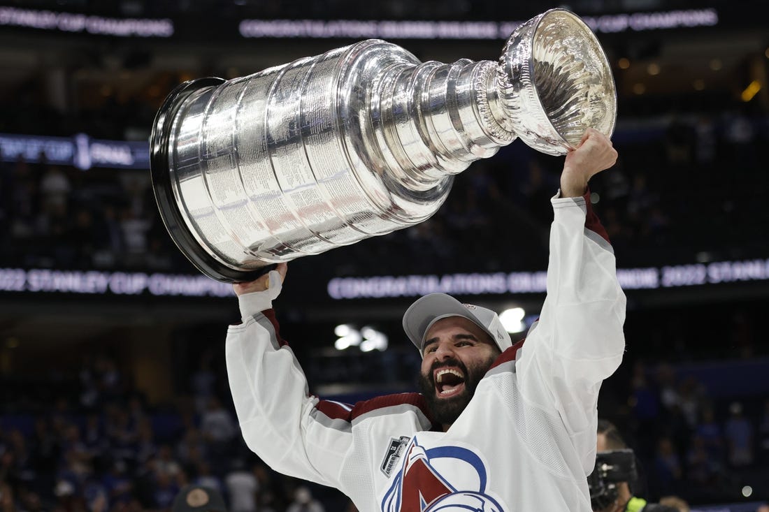 Jun 26, 2022; Tampa, Florida, USA; Colorado Avalanche center Nazem Kadri (91) celebrates with the Stanley Cup after the Avalanche game against the Tampa Bay Lightning in game six of the 2022 Stanley Cup Final at Amalie Arena. Mandatory Credit: Geoff Burke-USA TODAY Sports