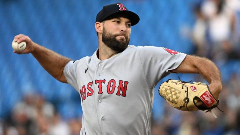 Jun 28, 2022; Toronto, Ontario, CAN;  Boston Red Sox starting pitcher Michael Wacha (52) delivers a pitch against the Toronto Blue Jays in the first inning at Rogers Centre. Mandatory Credit: Dan Hamilton-USA TODAY Sports