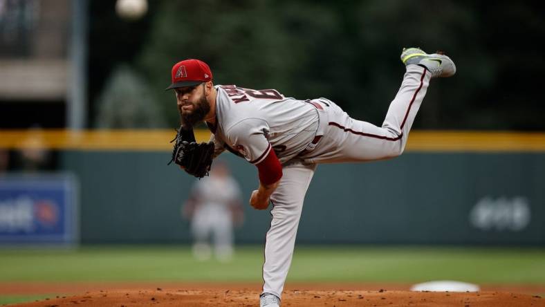 Jul 2, 2022; Denver, Colorado, USA; Arizona Diamondbacks starting pitcher Dallas Keuchel (60) pitches in the first inning against the Colorado Rockies at Coors Field. Mandatory Credit: Isaiah J. Downing-USA TODAY Sports