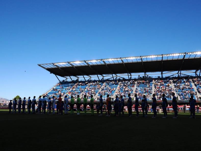 Jul 3, 2022; San Jose, California, USA; Chicago Fire and San Jose Earthquakes players line up for the national anthem before the game at PayPal Park. Mandatory Credit: Kelley L Cox-USA TODAY Sports
