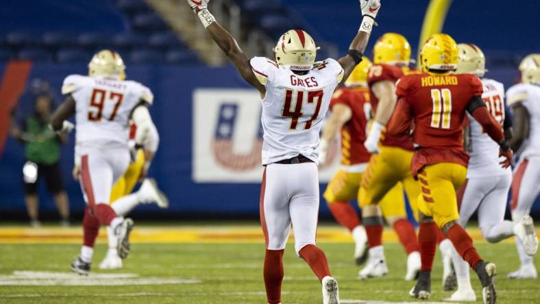 Jul 3, 2022; Canton, OH, USA; Birmingham Stallions outside linebacker DeMarquis Gates (47) celebrates an interception and touchdown against the Philadelphia Stars during the fourth quarter at Tom Benson Hall of Fame Stadium. Mandatory Credit: Scott Galvin-USA TODAY Sports