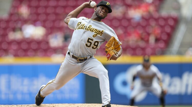 Jul 7, 2022; Cincinnati, Ohio, USA; Pittsburgh Pirates starting pitcher Roansy Contreras (59) pitches against the Cincinnati Reds in the second inning at Great American Ball Park. Mandatory Credit: Katie Stratman-USA TODAY Sports