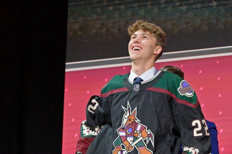 Jul 7, 2022; Montreal, Quebec, CANADA; Maveric Lamoureux after being selected as the number twenty-nine overall pick to the Arizona Coyotes in the first round of the 2022 NHL Draft at Bell Centre. Mandatory Credit: Eric Bolte-USA TODAY Sports
