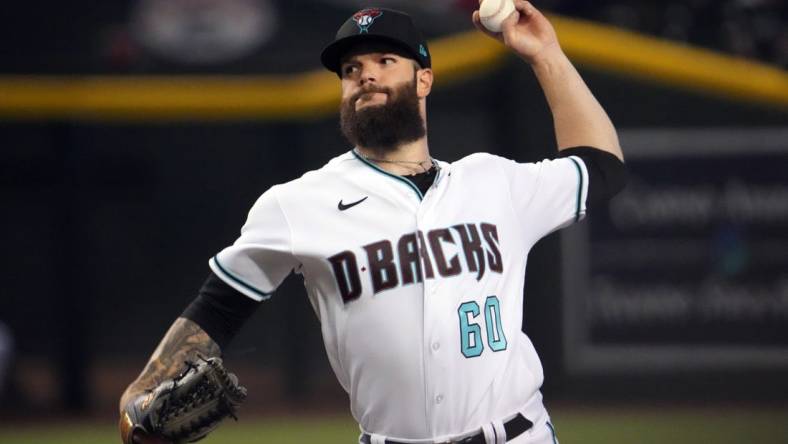 Jul 7, 2022; Phoenix, Arizona, USA; Arizona Diamondbacks starting pitcher Dallas Keuchel (60) pitches against the Colorado Rockies during the first inning at Chase Field. Mandatory Credit: Joe Camporeale-USA TODAY Sports