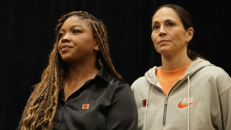 Jul 8, 2022; Chicago, IL, USA; Cherelle Griner (left) spouse of Brittney Griner  and Sue Bird during a press conference  addressing the detention of Brittney Griner in Russia at Hyatt Regency at McCormick Place. Mandatory Credit: David Banks-USA TODAY Sports