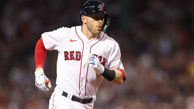 Jul 8, 2022; Boston, Massachusetts, USA; Boston Red Sox second baseman Trevor Story (10) rounds the bases after hitting a home run against the New York Yankees during the fourth inning at Fenway Park. Mandatory Credit: Paul Rutherford-USA TODAY Sports