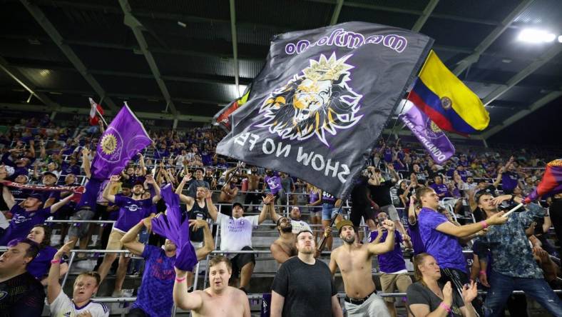 Jul 9, 2022; Orlando, Florida, USA; Fans celebrate after Orlando City beats Inter Miami at Exploria Stadium. Mandatory Credit: Nathan Ray Seebeck-USA TODAY Sports