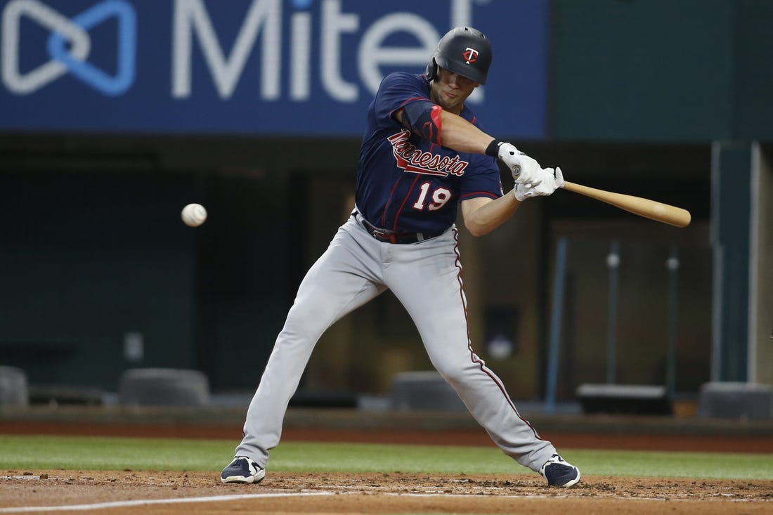 Jul 10, 2022; Arlington, Texas, USA; Minnesota Twins left fielder Alex Kirilloff (19) singles in the first inning against the Texas Rangers at Globe Life Field. Mandatory Credit: Tim Heitman-USA TODAY Sports