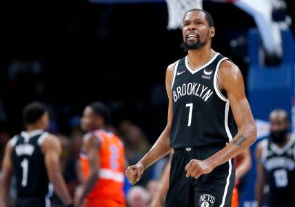 Nets forward Kevin Durant (7) reacts after a play against the Thunder during Brooklyn's 120-96 win on Nov. 14, 2021, at Paycom Center.

cutout