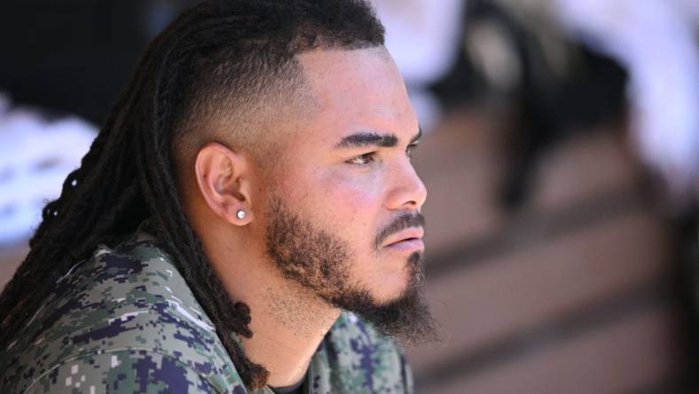 Jul 10, 2022; San Diego, California, USA; San Diego Padres relief pitcher Dinelson Lamet (29) looks on from the dugout during the sixth inning against the San Francisco Giants at Petco Park. Mandatory Credit: Orlando Ramirez-USA TODAY Sports