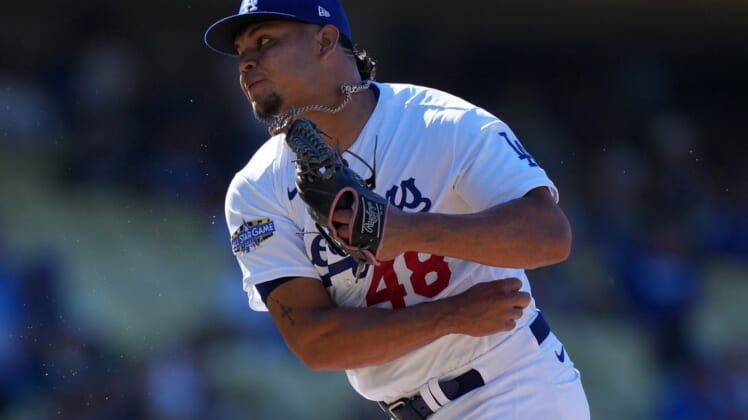 Jul 10, 2022; Los Angeles, California, USA; Los Angeles Dodgers relief pitcher Brusdar Graterol (48) celebrates at the end of the game against the Chicago Cubs at Dodger Stadium. Mandatory Credit: Kirby Lee-USA TODAY Sports