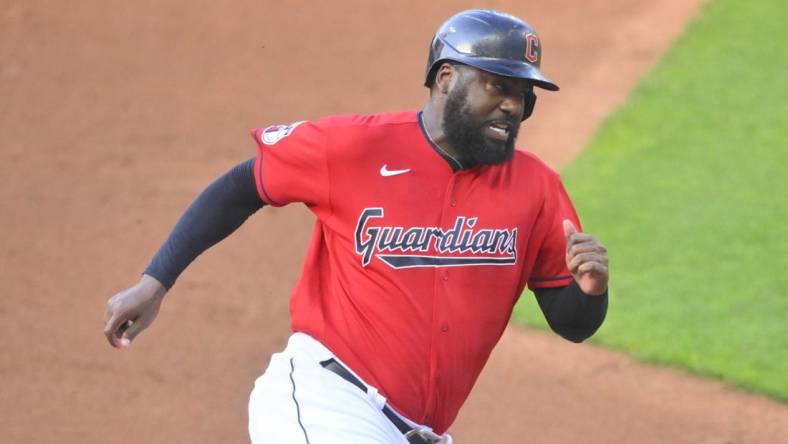 Jul 11, 2022; Cleveland, Ohio, USA; Cleveland Guardians designated hitter Franmil Reyes (32) rounds third base before scoring in the first inning against the Chicago White Sox at Progressive Field. Mandatory Credit: David Richard-USA TODAY Sports