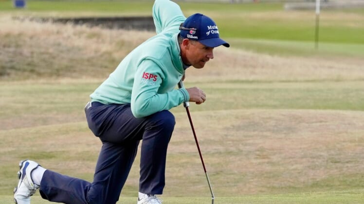 Jul 14, 2022; St. Andrews, SCT; Padraig Harrington lines up a putt on the 17th green during the first round of the 150th Open Championship golf tournament at St. Andrews Old Course. Mandatory Credit: Michael Madrid-USA TODAY Sports