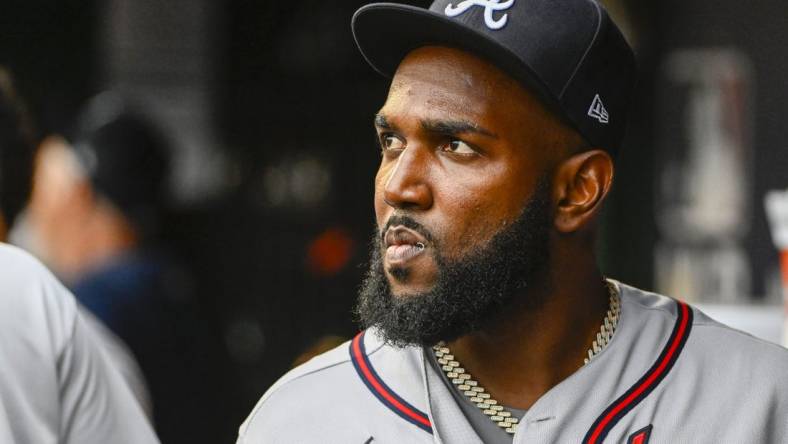 Jul 14, 2022; Washington, District of Columbia, USA; Atlanta Braves designated hitter Marcell Ozuna (20) in the dugout before the game against the Washington Nationals at Nationals Park. Mandatory Credit: Brad Mills-USA TODAY Sports