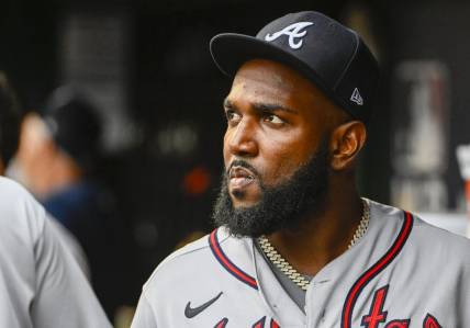 Jul 14, 2022; Washington, District of Columbia, USA; Atlanta Braves designated hitter Marcell Ozuna (20) in the dugout before the game against the Washington Nationals at Nationals Park. Mandatory Credit: Brad Mills-USA TODAY Sports