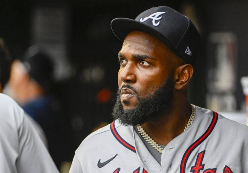 Jul 14, 2022; Washington, District of Columbia, USA; Atlanta Braves designated hitter Marcell Ozuna (20) in the dugout before the game against the Washington Nationals at Nationals Park. Mandatory Credit: Brad Mills-USA TODAY Sports