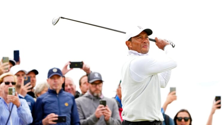 Jul 15, 2022; St. Andrews, SCT; Tiger Woods tees off on the seventh hole during the second round of the 150th Open Championship golf tournament at St. Andrews Old Course. Mandatory Credit: Rob Schumacher-USA TODAY Sports