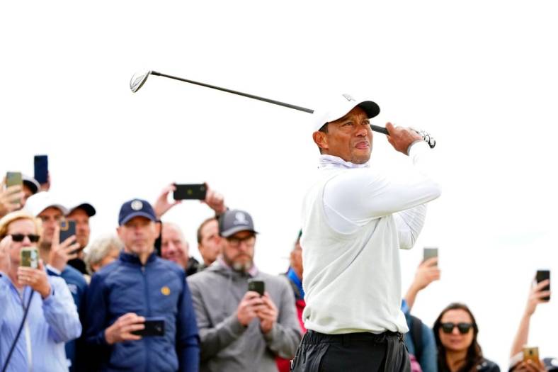 Jul 15, 2022; St. Andrews, SCT; Tiger Woods tees off on the seventh hole during the second round of the 150th Open Championship golf tournament at St. Andrews Old Course. Mandatory Credit: Rob Schumacher-USA TODAY Sports