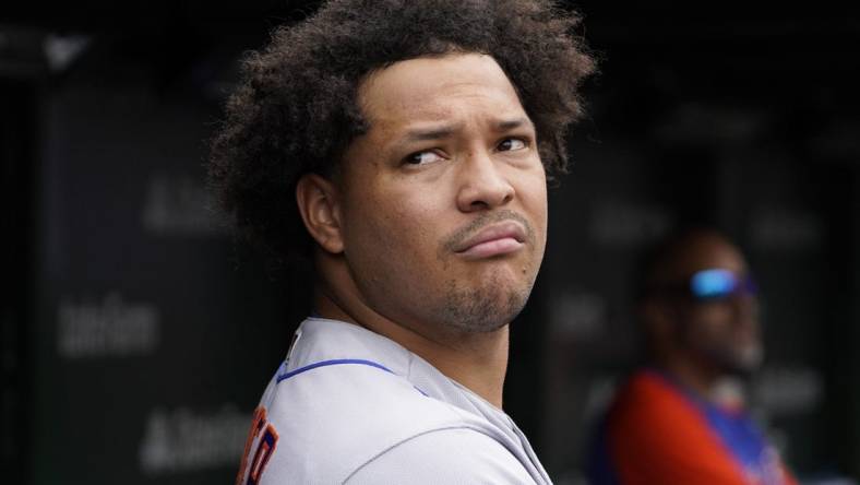 Jul 16, 2022; Chicago, Illinois, USA; New York Mets starting pitcher Taijuan Walker (99) in the dugout during the fifth inning in game one of a doubleheader at Wrigley Field. Mandatory Credit: David Banks-USA TODAY Sports