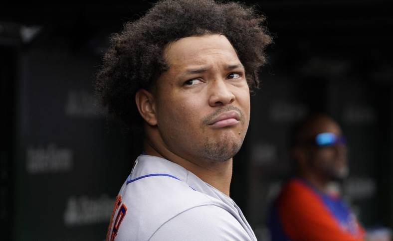Jul 16, 2022; Chicago, Illinois, USA; New York Mets starting pitcher Taijuan Walker (99) in the dugout during the fifth inning in game one of a doubleheader at Wrigley Field. Mandatory Credit: David Banks-USA TODAY Sports