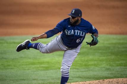 Jul 16, 2022; Arlington, Texas, USA; Seattle Mariners relief pitcher Diego Castillo (63) pitches against the Texas Rangers during the ninth inning at Globe Life Field. Mandatory Credit: Jerome Miron-USA TODAY Sports