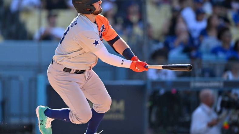 Jul 16, 2022; Los Angeles, CA, USA; American League Futures catcher Shea Langeliers (33) hits a solo home run in the fourth inning of the All Star-Futures Game at Dodger Stadium. Mandatory Credit: Jayne Kamin-Oncea-USA TODAY Sports