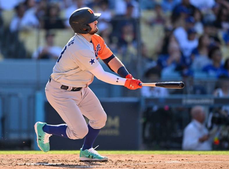 Jul 16, 2022; Los Angeles, CA, USA; American League Futures catcher Shea Langeliers (33) hits a solo home run in the fourth inning of the All Star-Futures Game at Dodger Stadium. Mandatory Credit: Jayne Kamin-Oncea-USA TODAY Sports