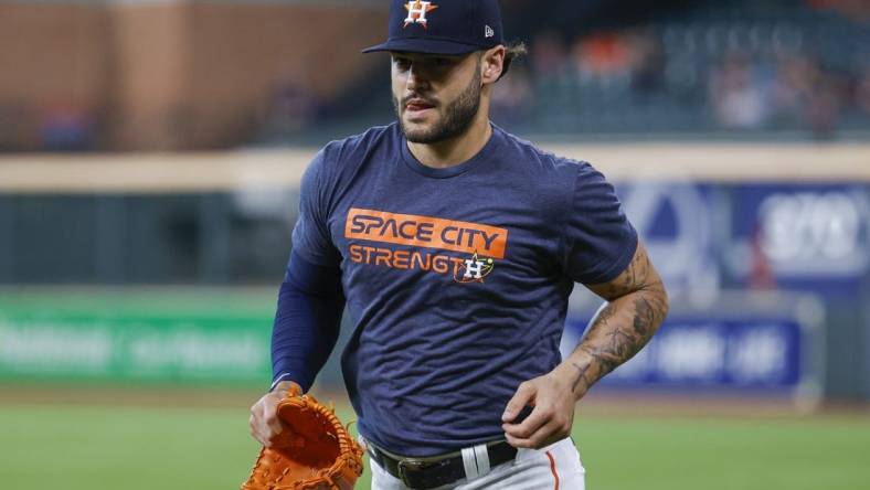 Jul 17, 2022; Houston, Texas, USA; Houston Astros pitcher Lance McCullers Jr. jogs on the field before the game against the Oakland Athletics at Minute Maid Park. Mandatory Credit: Troy Taormina-USA TODAY Sports