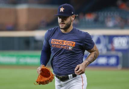 Jul 17, 2022; Houston, Texas, USA; Houston Astros pitcher Lance McCullers Jr. jogs on the field before the game against the Oakland Athletics at Minute Maid Park. Mandatory Credit: Troy Taormina-USA TODAY Sports