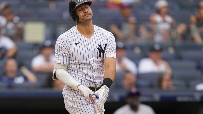 Jul 17, 2022; Bronx, New York, USA; New York Yankees right fielder Joey Gallo (13) reacts to hitting a fly ball out during the eighth inning against the Boston Red Sox at Yankee Stadium. Mandatory Credit: Gregory Fisher-USA TODAY Sports