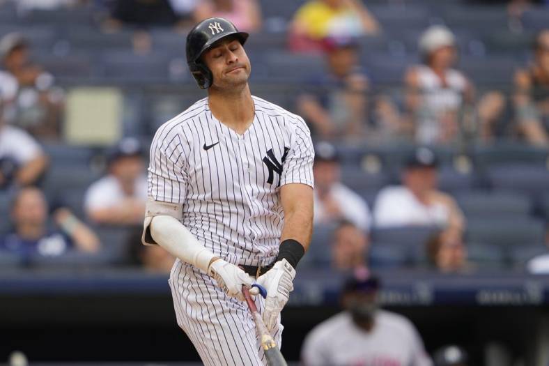 Jul 17, 2022; Bronx, New York, USA; New York Yankees right fielder Joey Gallo (13) reacts to hitting a fly ball out during the eighth inning against the Boston Red Sox at Yankee Stadium. Mandatory Credit: Gregory Fisher-USA TODAY Sports
