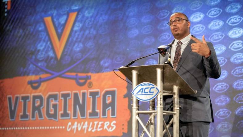 Jul 21, 2022; Charlotte, NC, USA;  Virginia Head Coach Tony Elliott talks to the media during the second day of ACC Media Days at the Westin Hotel in Charlotte, NC. Mandatory Credit: Jim Dedmon-USA TODAY Sports