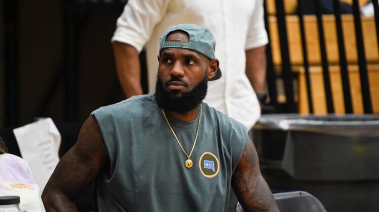 Basketball great LeBron James sits on the sidelines during The Skill Factory and Strive for Greatness game at the Peach Jam in North Augusta, S.C., on Thursday, July 21, 2022. TSF defeated Strive for Greatness 65-50.Sports Peach Jam The Skill Factory V Strive For Greatness