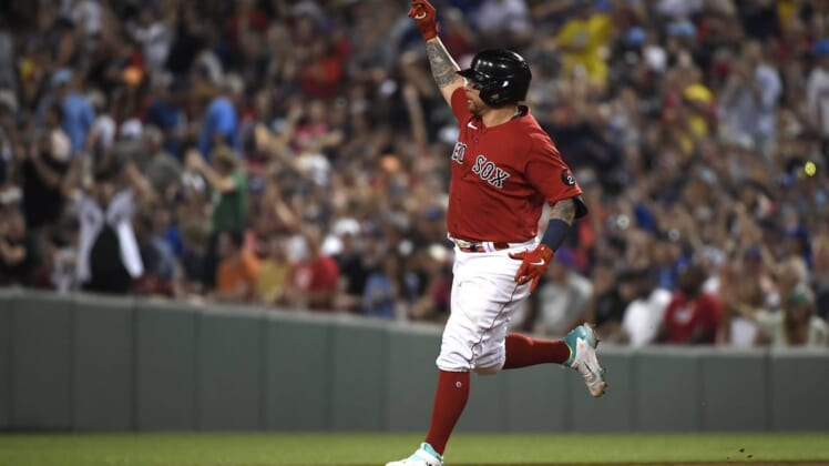 Jul 22, 2022; Boston, Massachusetts, USA;  Boston Red Sox first baseman Christian Vazquez (7) reacts after hitting a home run during the fourth inning against the Toronto Blue Jays at Fenway Park. Mandatory Credit: Bob DeChiara-USA TODAY Sports