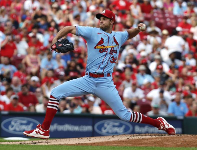 Jul 23, 2022; Cincinnati, Ohio, USA; St. Louis Cardinals starting pitcher Steven Matz (32) throws a pitch against the Cincinnati Reds during the first inning at Great American Ball Park. Mandatory Credit: David Kohl-USA TODAY Sports
