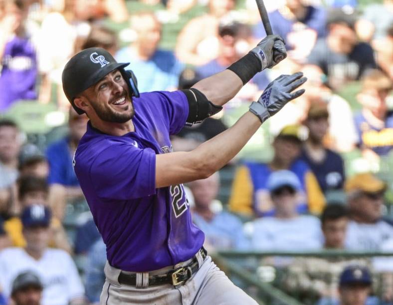 Jul 24, 2022; Milwaukee, Wisconsin, USA; Colorado Rockies left fielder Kris Bryant (23) watches after hitting a 2-run home run in the fifth inning against the Milwaukee Brewers at American Family Field. Mandatory Credit: Benny Sieu-USA TODAY Sports