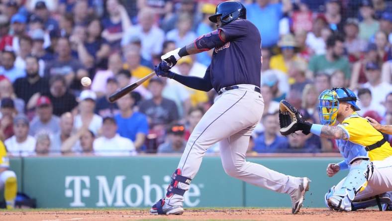 Jul 25, 2022; Boston, Massachusetts, USA; Cleveland Guardians designated hitter Franmil Reyes (32) hits a single against the Boston Red Sox during the second inning at Fenway Park. Mandatory Credit: Gregory Fisher-USA TODAY Sports