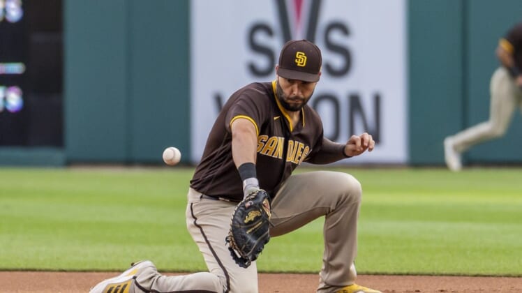 Jul 25, 2022; Detroit, Michigan, USA; San Diego Padres first baseman Eric Hosmer (30) makes a fielding error during the third inning on a ground ball from Detroit Tigers first baseman Harold Castro (30) at Comerica Park. Mandatory Credit: Raj Mehta-USA TODAY Sports