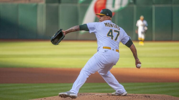 Jul 26, 2022; Oakland, California, USA; Oakland Athletics starting pitcher Frankie Montas (47) throws a pitch against the Houston Astros during the first inning at RingCentral Coliseum. Mandatory Credit: Ed Szczepanski-USA TODAY Sports