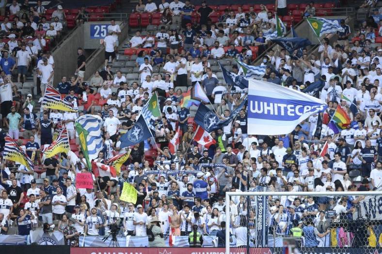 Jul 26, 2022; Vancouver, BC, Canada;  Vancouver Whitecaps FC fans cheer before the start of the first half against Toronto FC at BC Place. Mandatory Credit: Anne-Marie Sorvin-USA TODAY Sports