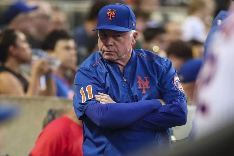 Jul 23, 2022; New York City, New York, USA; New York Mets manager Buck Showalter (11) looks on in the dugout during the game against the San Diego Padres at Citi Field. Mandatory Credit: Wendell Cruz-USA TODAY Sports